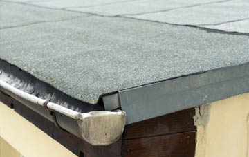 repair or replace Pootings flat roofing?